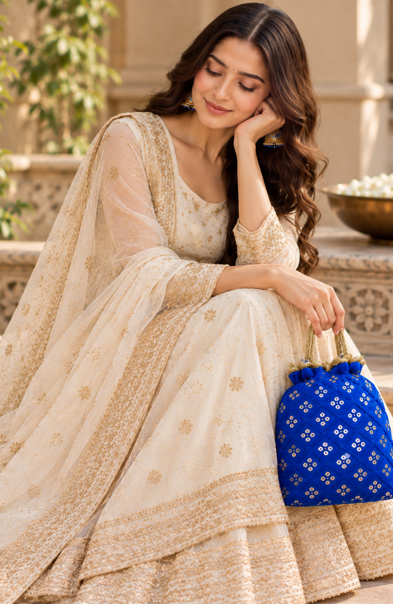 Royal Blue Quilted Potli Bag With Gold Embroidery