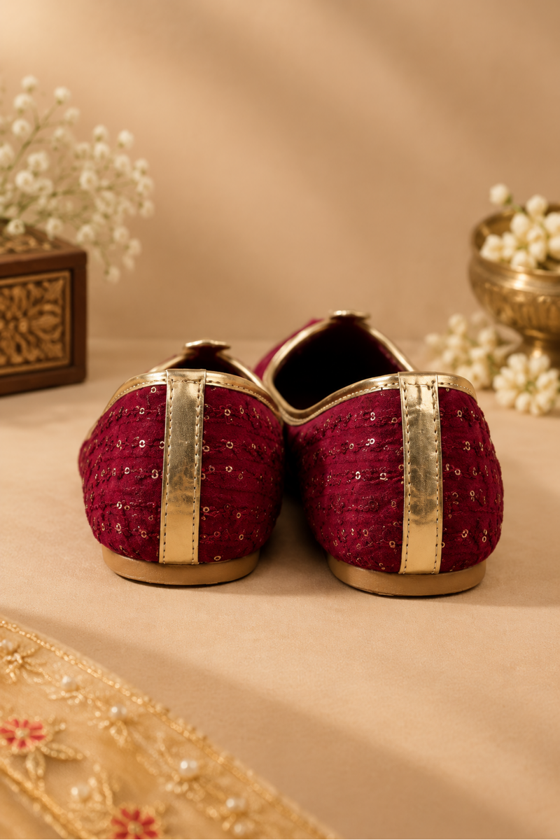 Maroon Velvet Embellished Juttis With Gold Piping